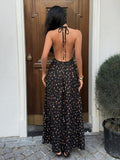 Capture effortless elegance with this blue plaid halter maxi dress, designed to blend classic charm with modern sophistication.