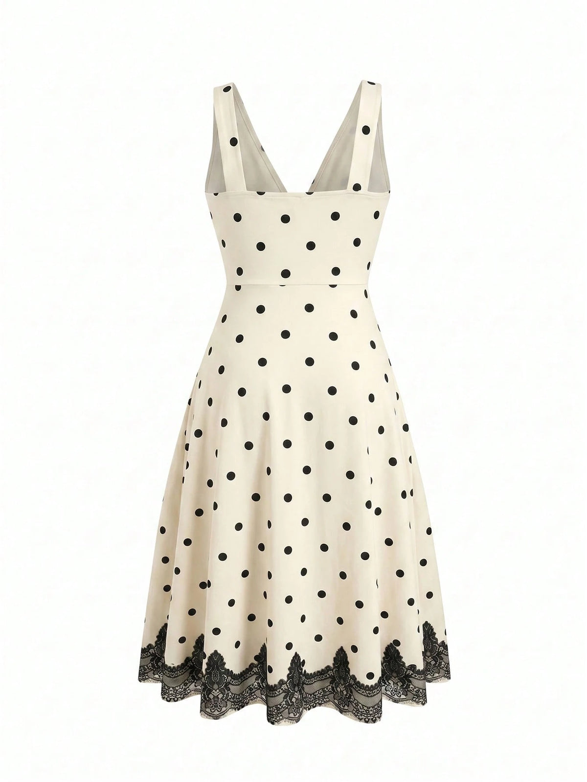 An off-white sleeveless A-line dress with black polka dots and a black lace hem, shown against a plain white background.