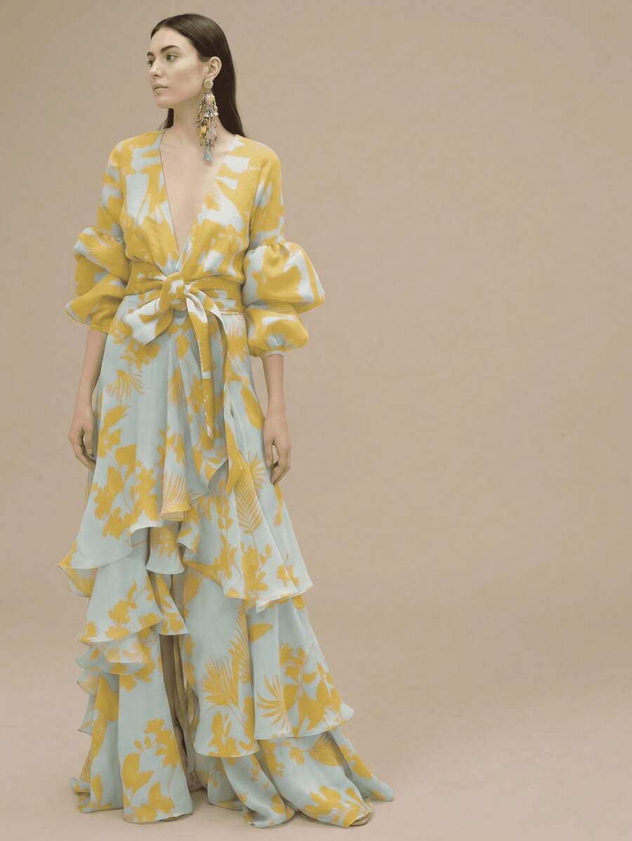 Front studio view of yellow tropical print deep V-neck maxi dress with self-tie bow