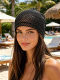 White textured floral mesh crochet beanie with raised appliques