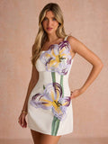 Three-quarter view of white sleeveless floral appliqué occasion dress with straight hem