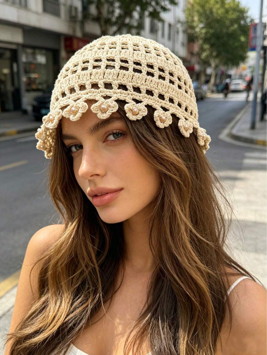 Ivory open weave crochet bucket hat with flower appliques around brim