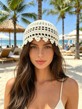 Black sequin crochet cloche hat with floral trim and downturned brim
