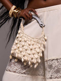 Boho beach handbag with pearl bead net overlay and white shell fringe
