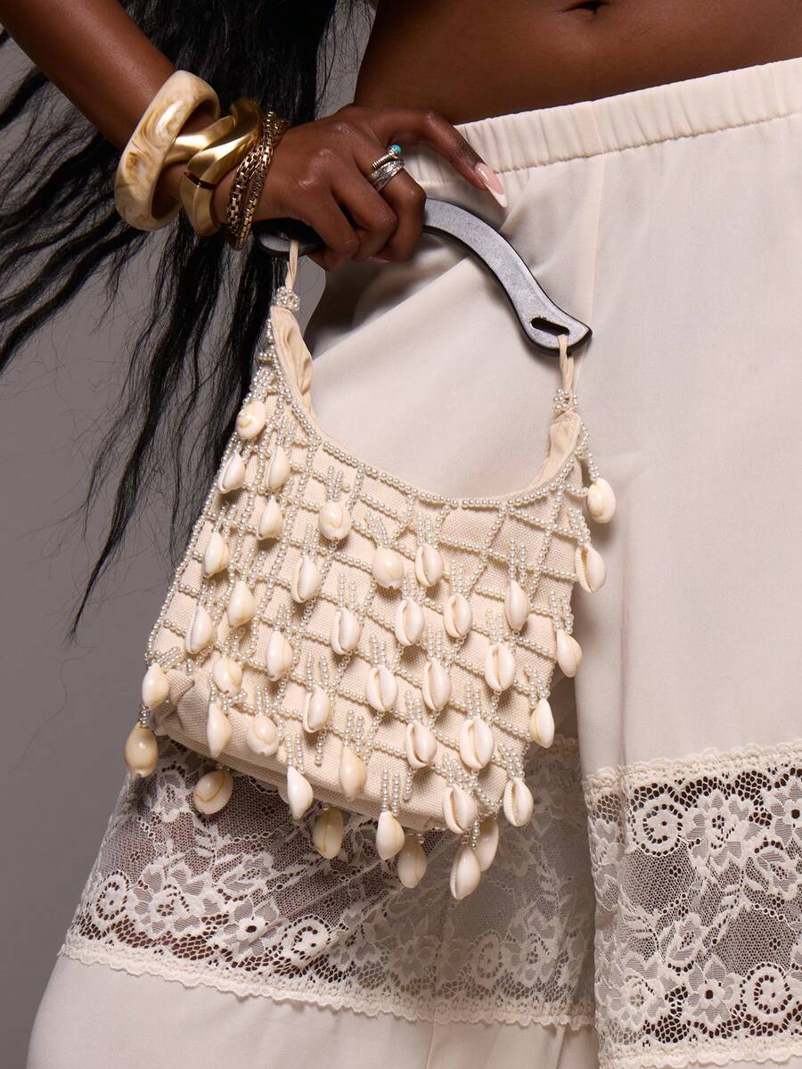 Boho beach handbag with pearl bead net overlay and white shell fringe