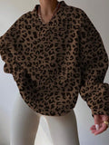 Front worn view of chocolate brown leopard-print V-neck sweatshirt with balloon sleeves