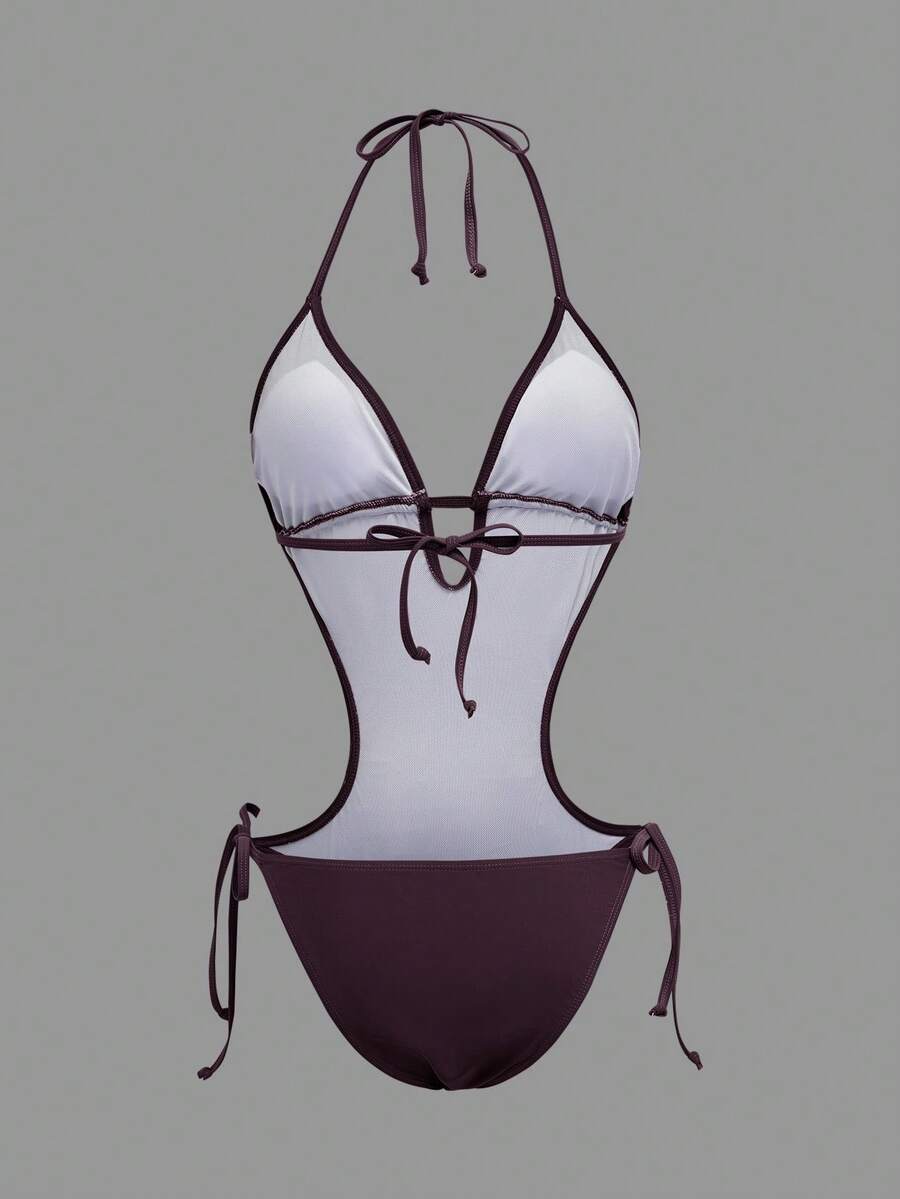 Back studio view of dark burgundy halter cutout one-piece swimsuit with open back and tie details for beach party styling