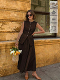 Front View of deep brown sleeveless vest and maxi skirt set for office and daily wear