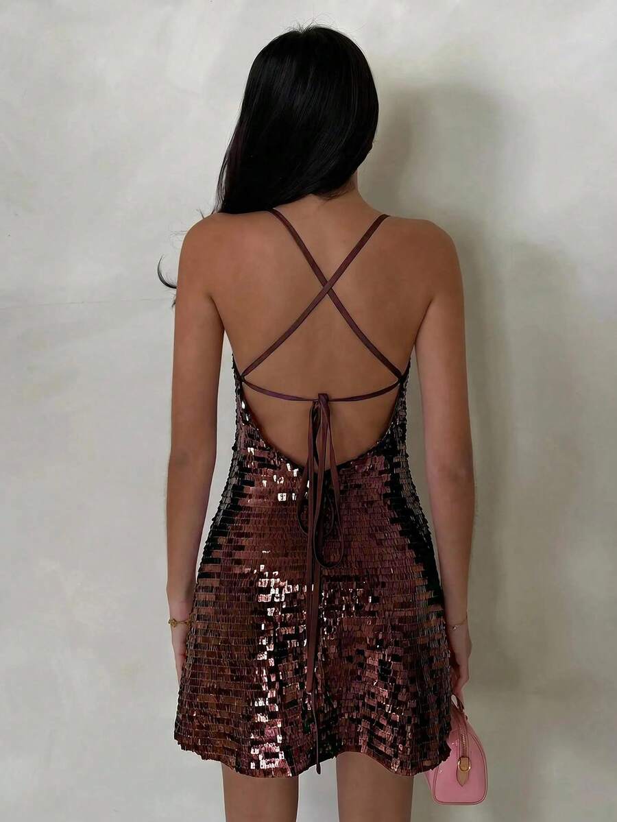 open back sequin cami mini dress with scoop neckline, spaghetti straps, crisscross tie back, fitted bodice, slight A-line mini skirt, iridescent sequin variants and orange floral print variant image 14