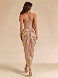 Back view pink gold halter midi dress with tie neck zipper and gathered draped skirt