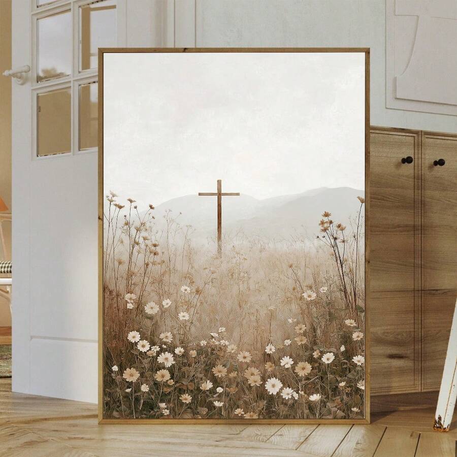 Large wood framed Christian cross wildflower canvas leaning in a neutral room