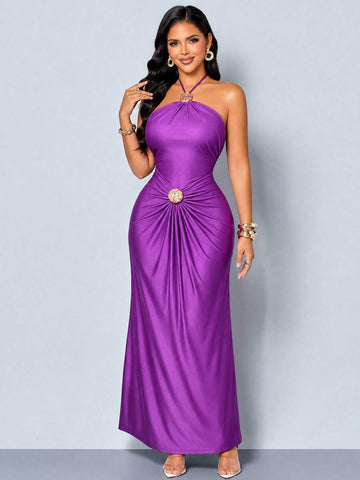 Full front view of purple halter maxi evening dress with gold-tone neck and waist ornaments