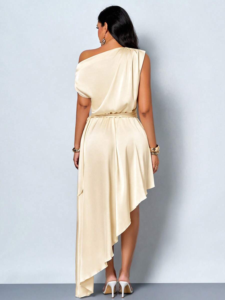 Full front view of champagne satin one-shoulder dress with asymmetric high-low wrap hem