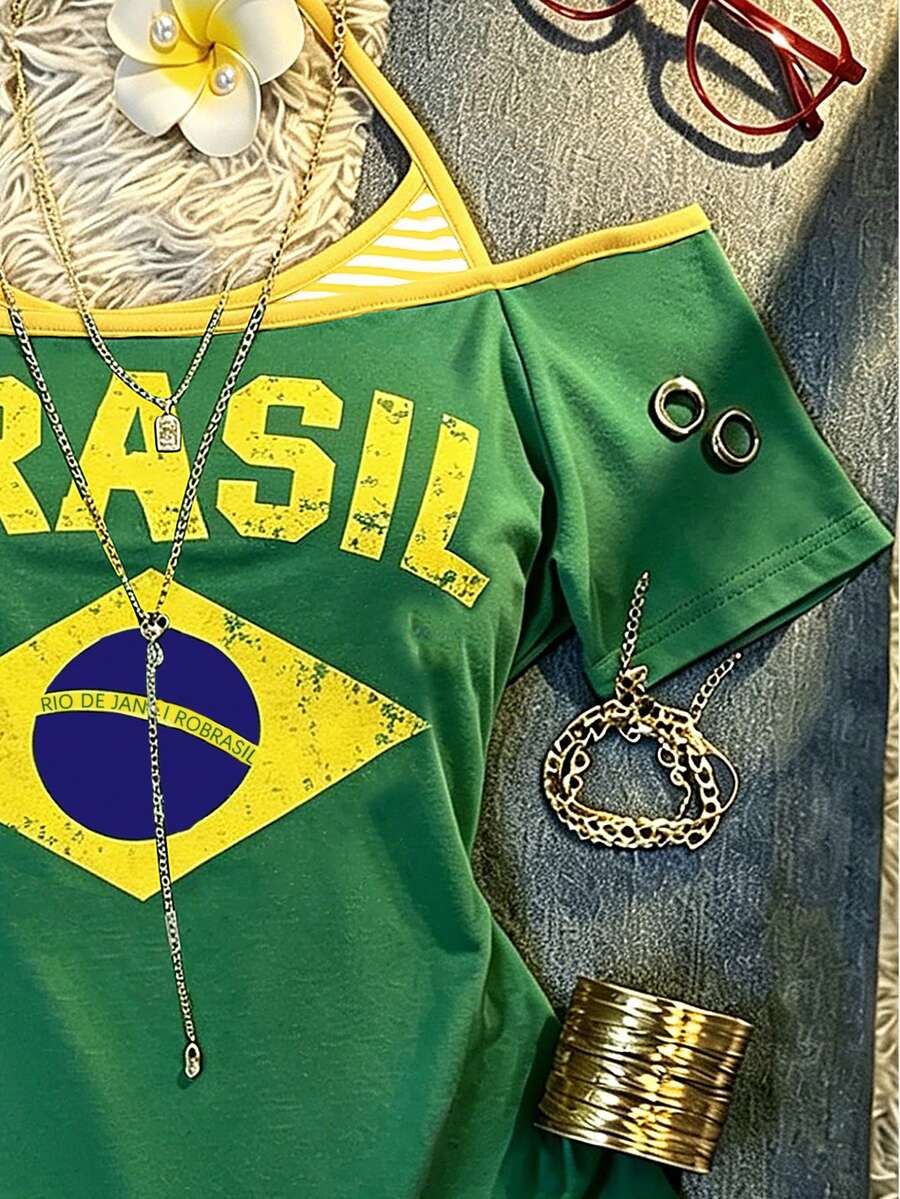 Close-up of green Brasil graphic top showing flag motif, striped insert, and distressed text