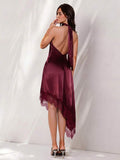 Back view of burgundy satin halter mini dress with open back and long neck ties
