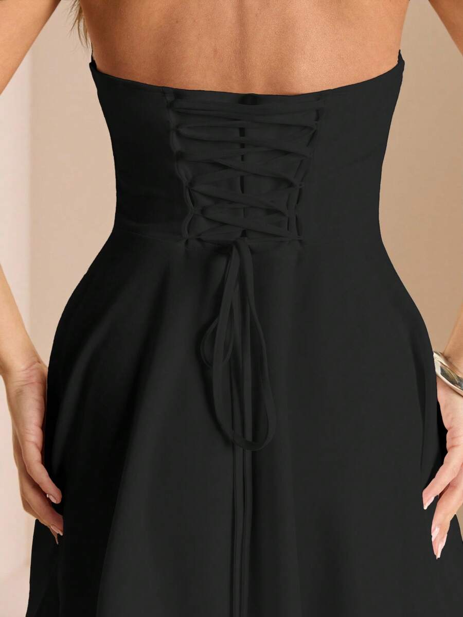 Black lace-up waist dress detail