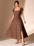 Front view of coffee brown floral jacquard midi dress with square neck, flutter sleeves, A-line skirt, and thigh slit