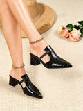 Black patent croc embossed pointed mules with block heel and instep strap