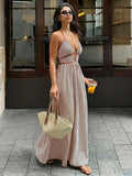 Turn heads with this effortlessly chic striped halter maxi dress, designed for sunny beach days, tropical vacations, and warm-weather celebrations. The flattering deep V-neckline and halter design create a feminine silhouette, while the flowing maxi length offers graceful movement with every step
