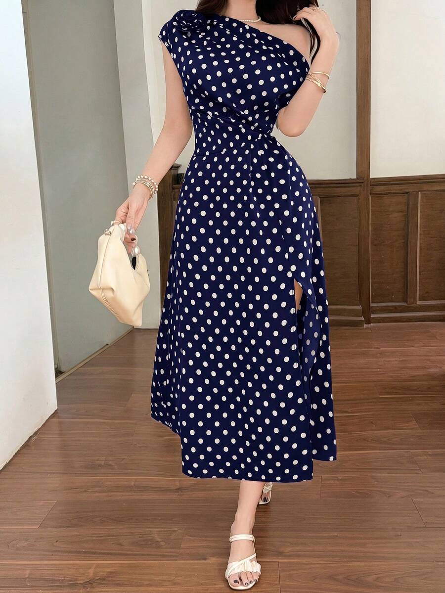 Full front view of navy polka dot maxi dress with 3D rose