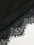 Black fitted party mini dress with scalloped lace edge