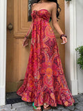 Pink paisley strapless halter maxi dress with empire waist and long A-line skirt