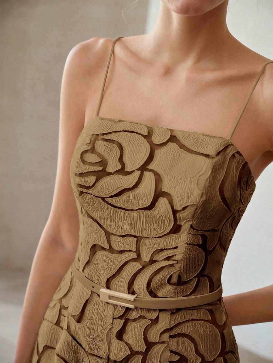 Close-up of khaki rose texture jumpsuit fitted bodice and slim buckle belt