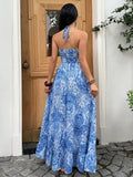 Back view bright blue white paisley maxi dress with halter tie and ruffle hem