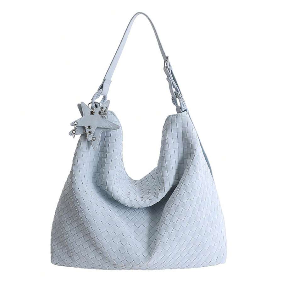 Front product view of baby blue woven hobo shoulder bag with star charm and metal rings