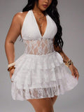 White lace halter mini dress with deep V neckline and sheer waist close view