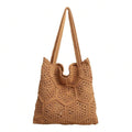 Front studio view of tan crochet tote bag with floral hexagon openwork and long straps