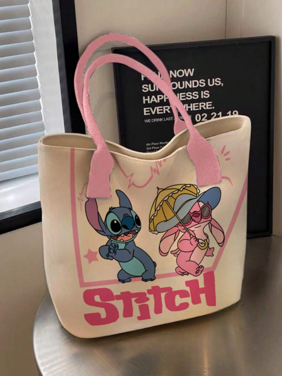 Cream tote bag with pink handles featuring Stitch and Angel pink graphics and large STITCH text