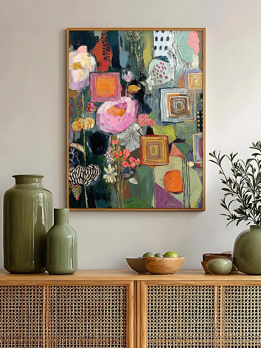 Living room view of abstract floral collage wall art in a slim gold frame