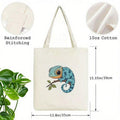 Product spec view of white 10oz cotton canvas tote with chameleon print and reinforced stitching