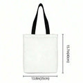 Back view of plain white canvas tote bag with black straps and size measurement