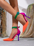 Close side view coral green purple pointed stiletto pumps