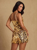 Back view of gold sequin camisole romper with thin straps