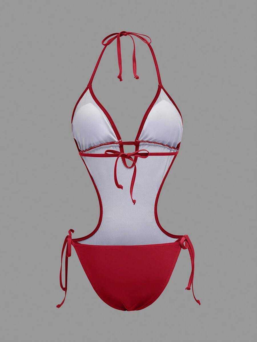 Back studio view of red halter cutout one-piece swimsuit with open back and tie details for beach party styling