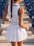 striped half zip sleeveless tennis golf mini dress with built in shorts, pleated skirt and pocket image 2