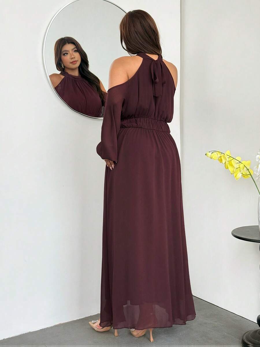 Angled front view of wine red plus size halter cold-shoulder maxi dress
