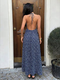 Capture effortless elegance with this blue plaid halter maxi dress, designed to blend classic charm with modern sophistication.