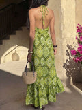Back view green paisley halter maxi dress with open back and neck tie