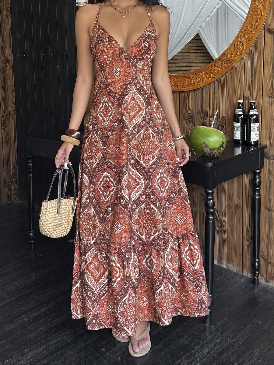 Rust orange paisley halter maxi dress with ruffle hem and woven handbag