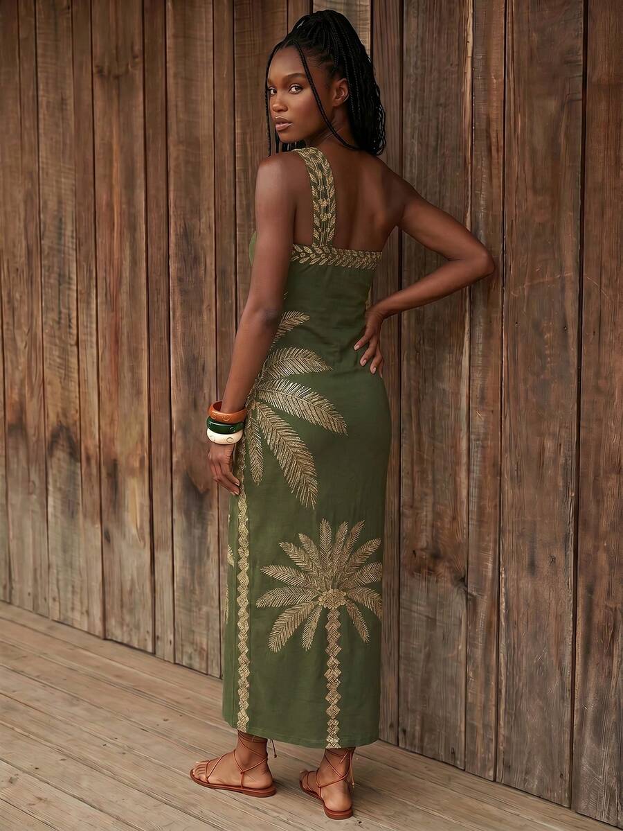 Back view of olive green palm print one-shoulder maxi dress with open back