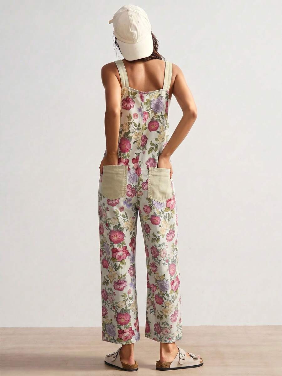 Close front view of cream floral woven suspender jumpsuit with bib pocket