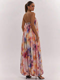 Floral strapless jumpsuit back view with open shoulders