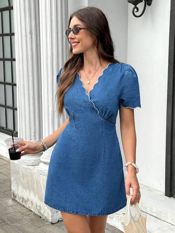 Blue denim wrap mini dress with V-neck scallop trim and puff sleeves