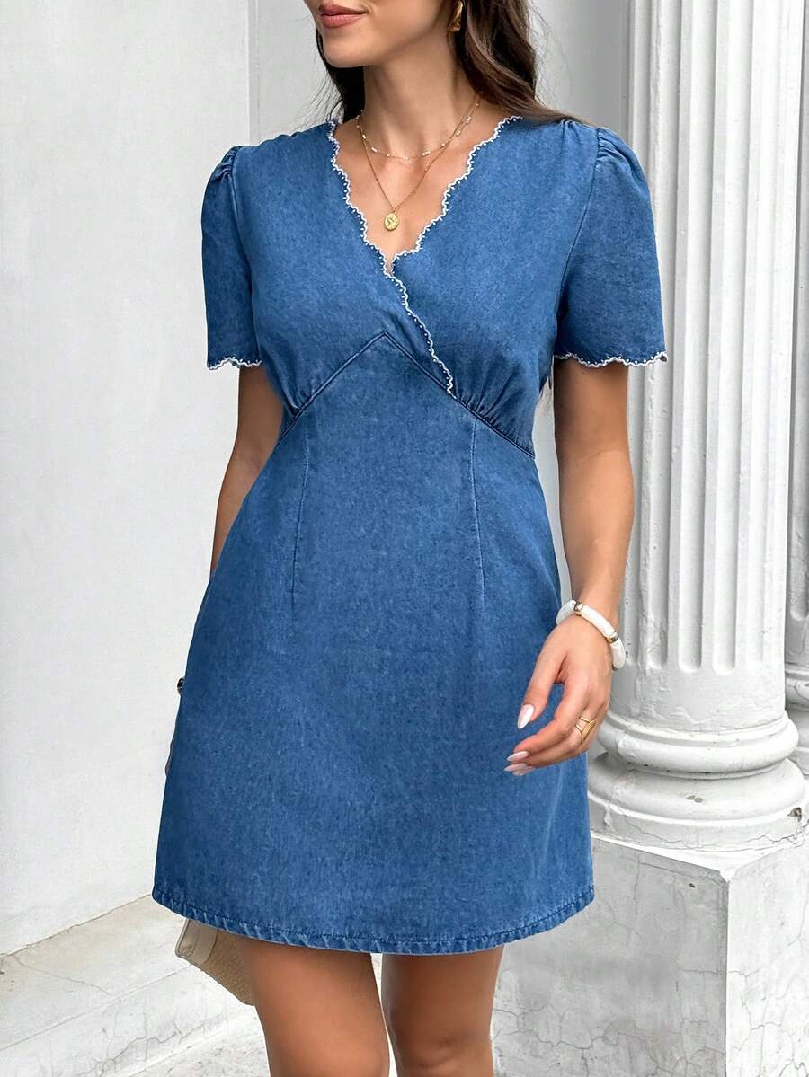 Blue denim wrap mini dress with V-neck scallop trim and puff sleeves