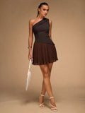 Dark brown one-shoulder mini dress with structured top and pleated skirt