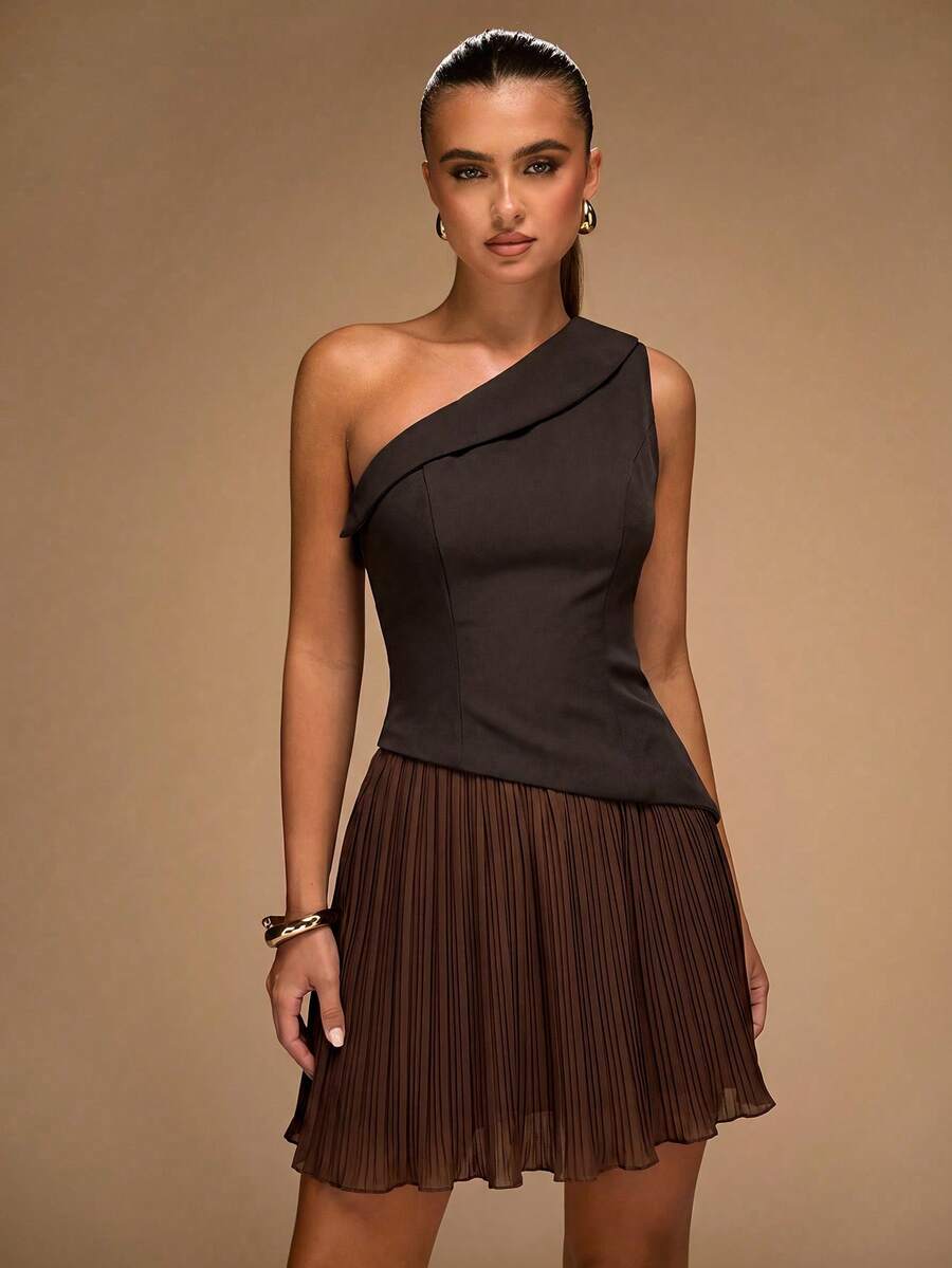 Dark brown one-shoulder mini dress with diagonal draped neckline and pleated skirt